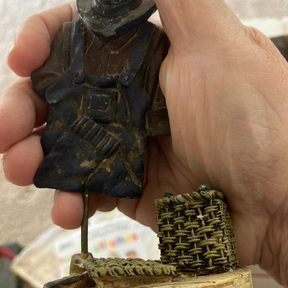 Fisherman figurine